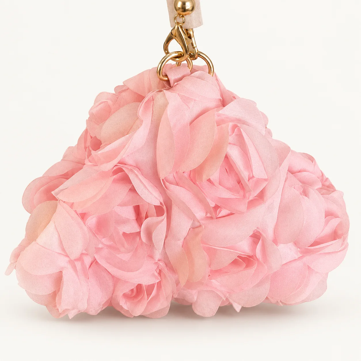 Layered pink fabric rosette with a gold clasp